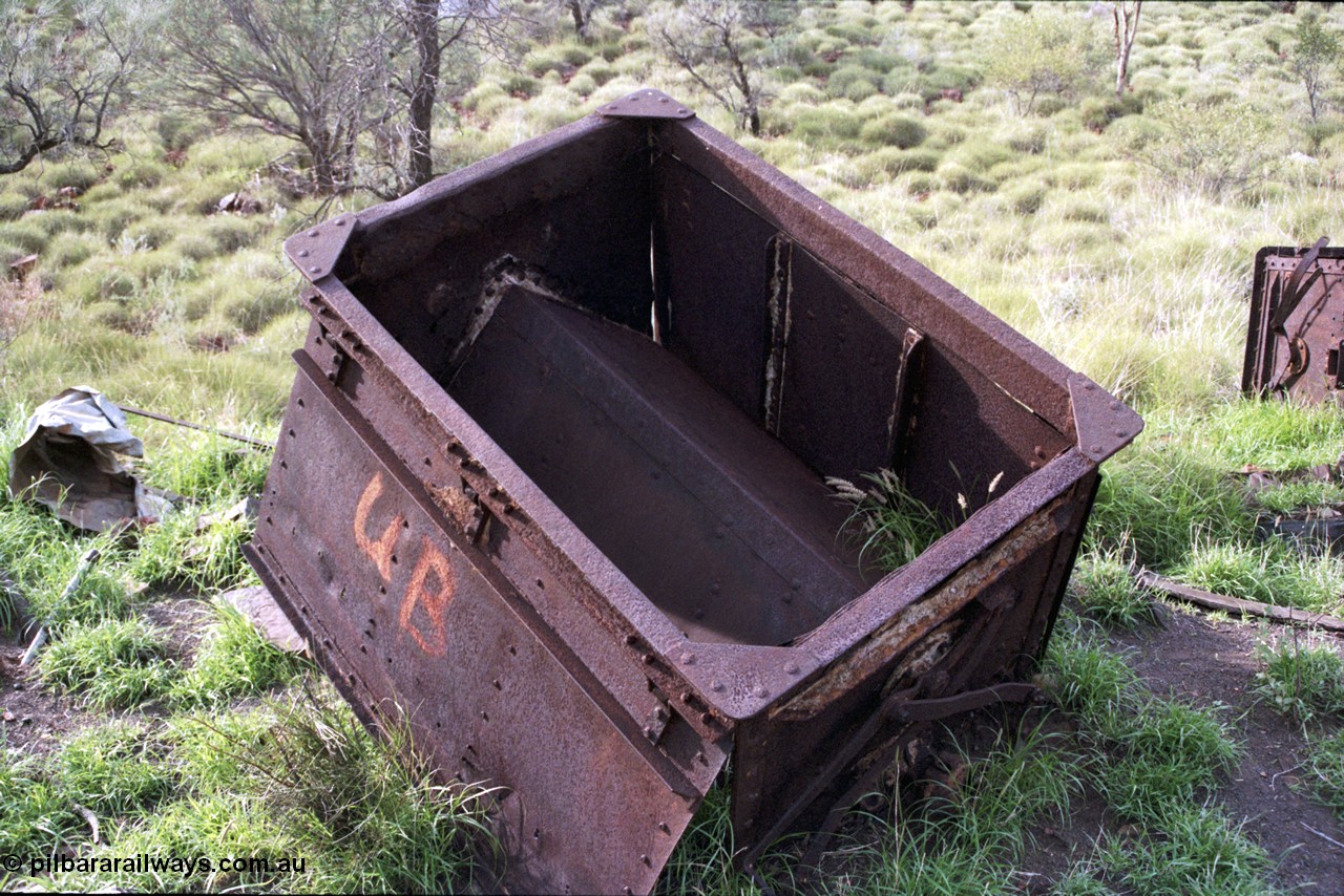 196-21
Wittenoom Gorge, Gorge Mine area, asbestos mining remains, side open self discharge ore waggons, shows door mechanism.
