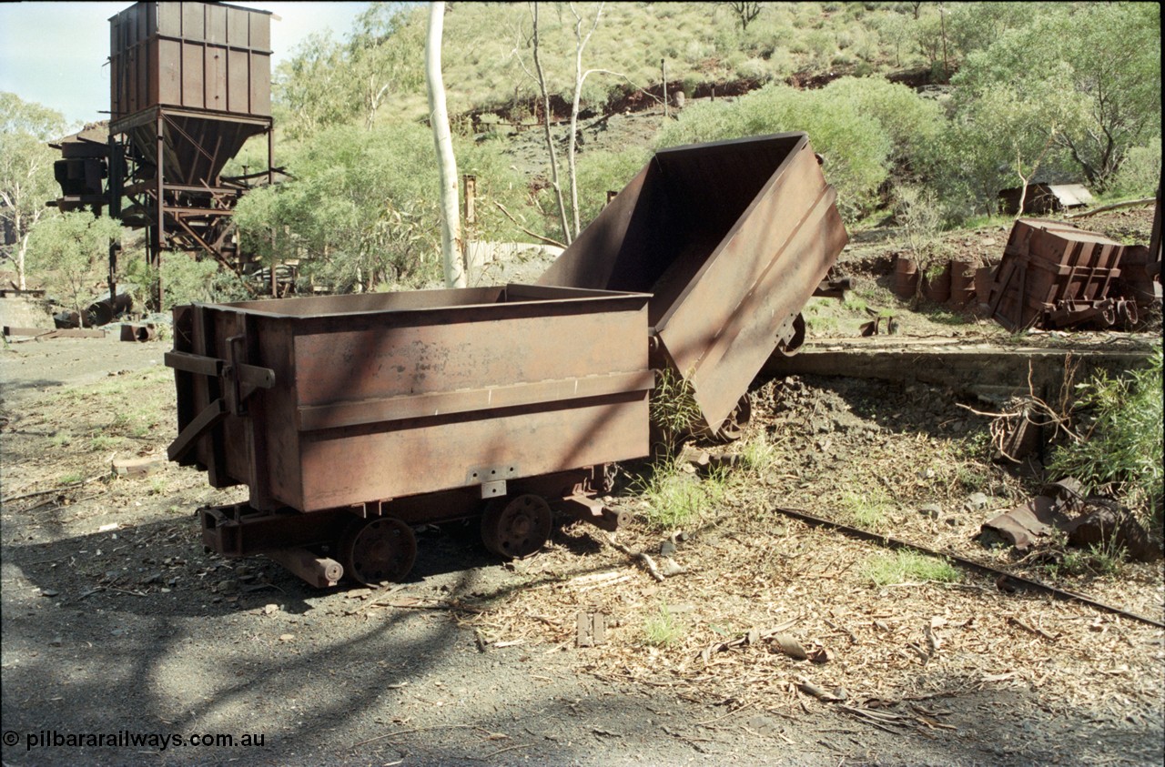 196-32
Wittenoom Gorge, Gorge Mine area, asbestos mining remains, side tipping ore waggons, one can be seen in the background in the tipped position.
