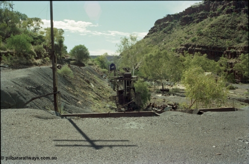 196-31
Wittenoom Gorge, Gorge Mine area, asbestos mining remains, view of the remains of the demolished buildings which formed the mill here, looking north east towards the power station.
