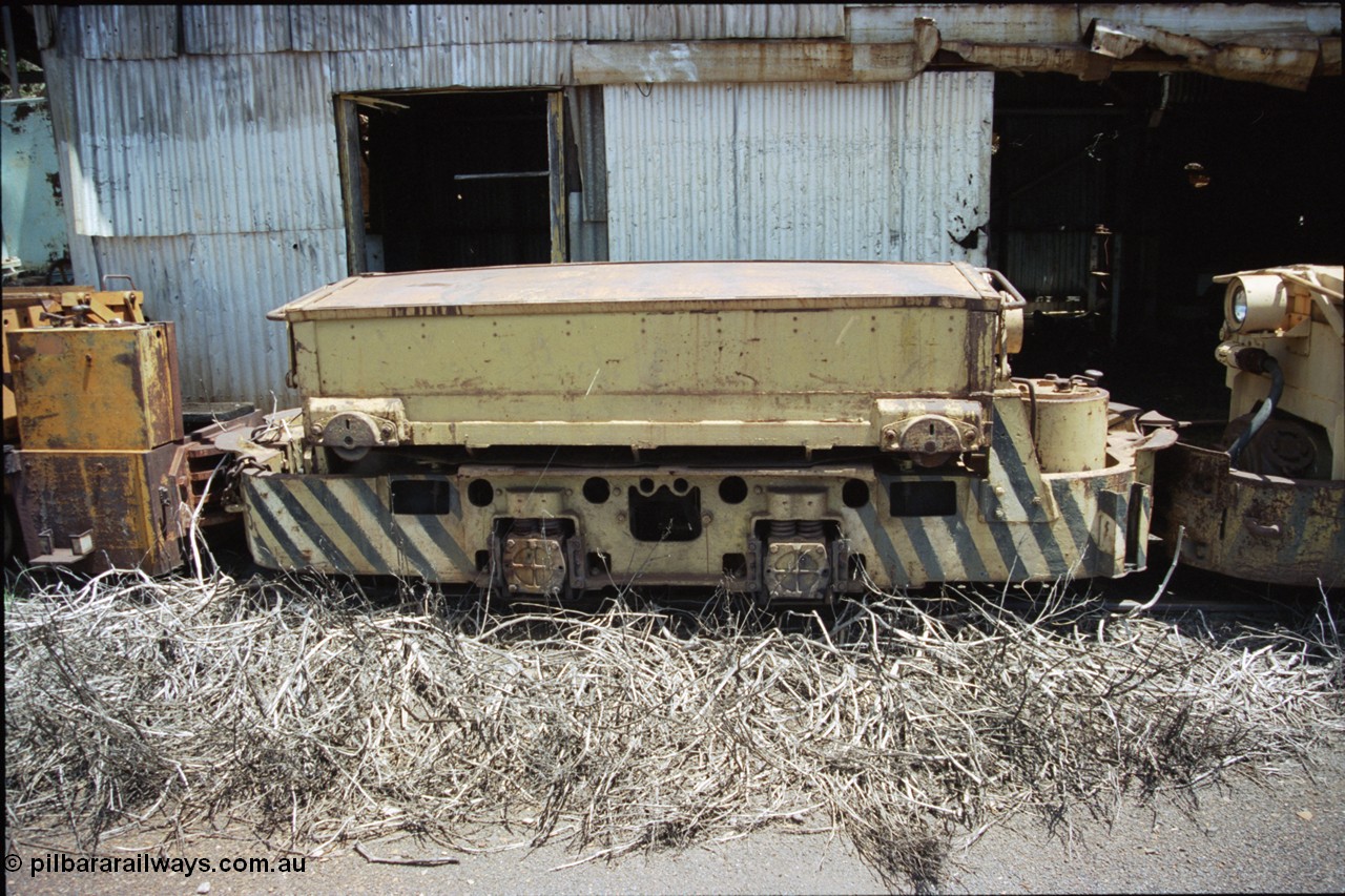 197-35
Wittenoom, Colonial Mine, side view of a Mancha locomotive, view of frame with axle arrangement and battery module.
Keywords: Mancha;