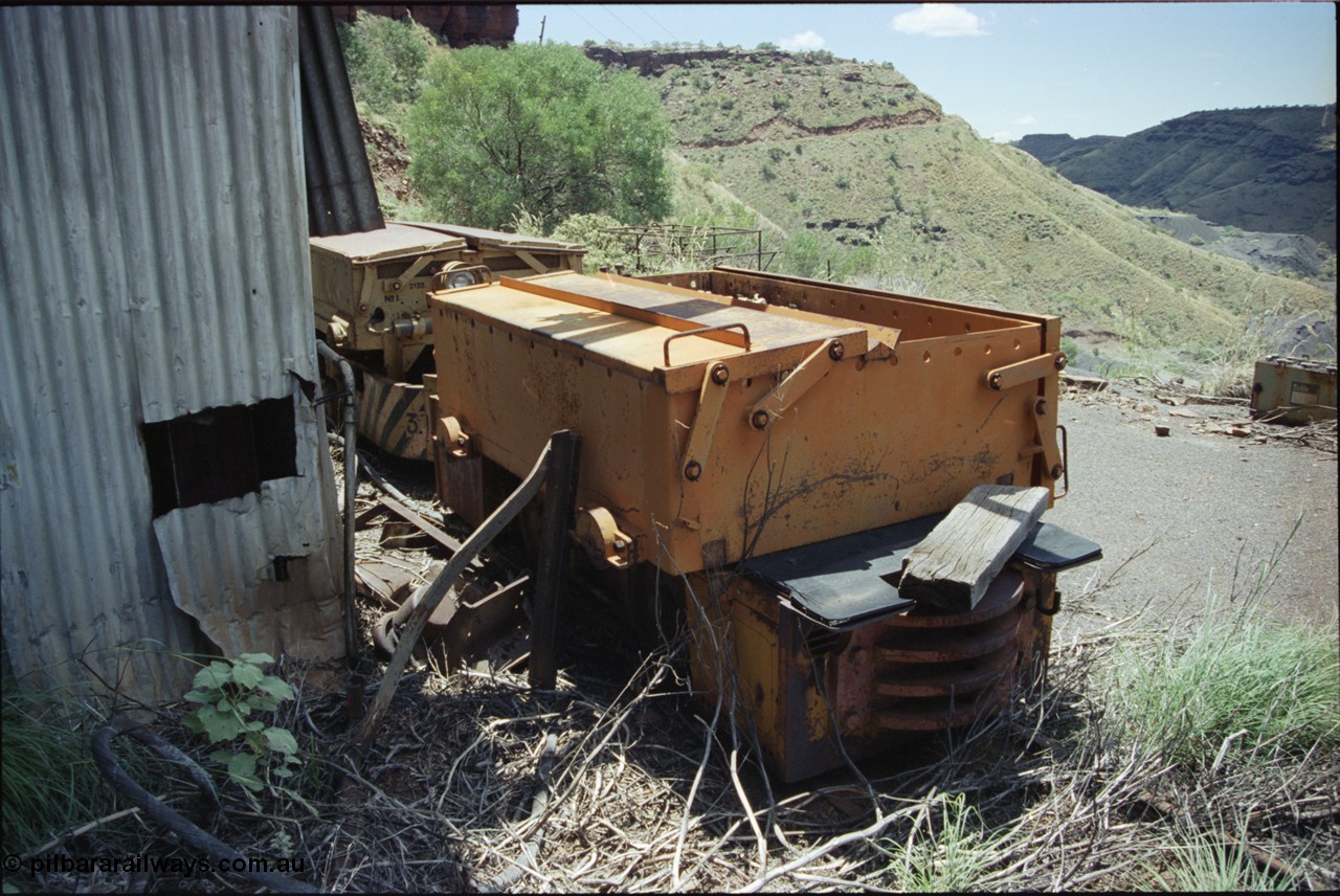 198-01
Wittenoom, Colonial Mine, asbestos mining remains, rear view of battery box and battery locomotive GEMCO Hauler serial 12304-05/10/65, motor H.P. 2/11, volts 80, drawbar pull (lbs.) 1250 built by George Moss Pty Ltd Leederville, WA.
Keywords: Gemco;George-Moss;12304-05/10/65;