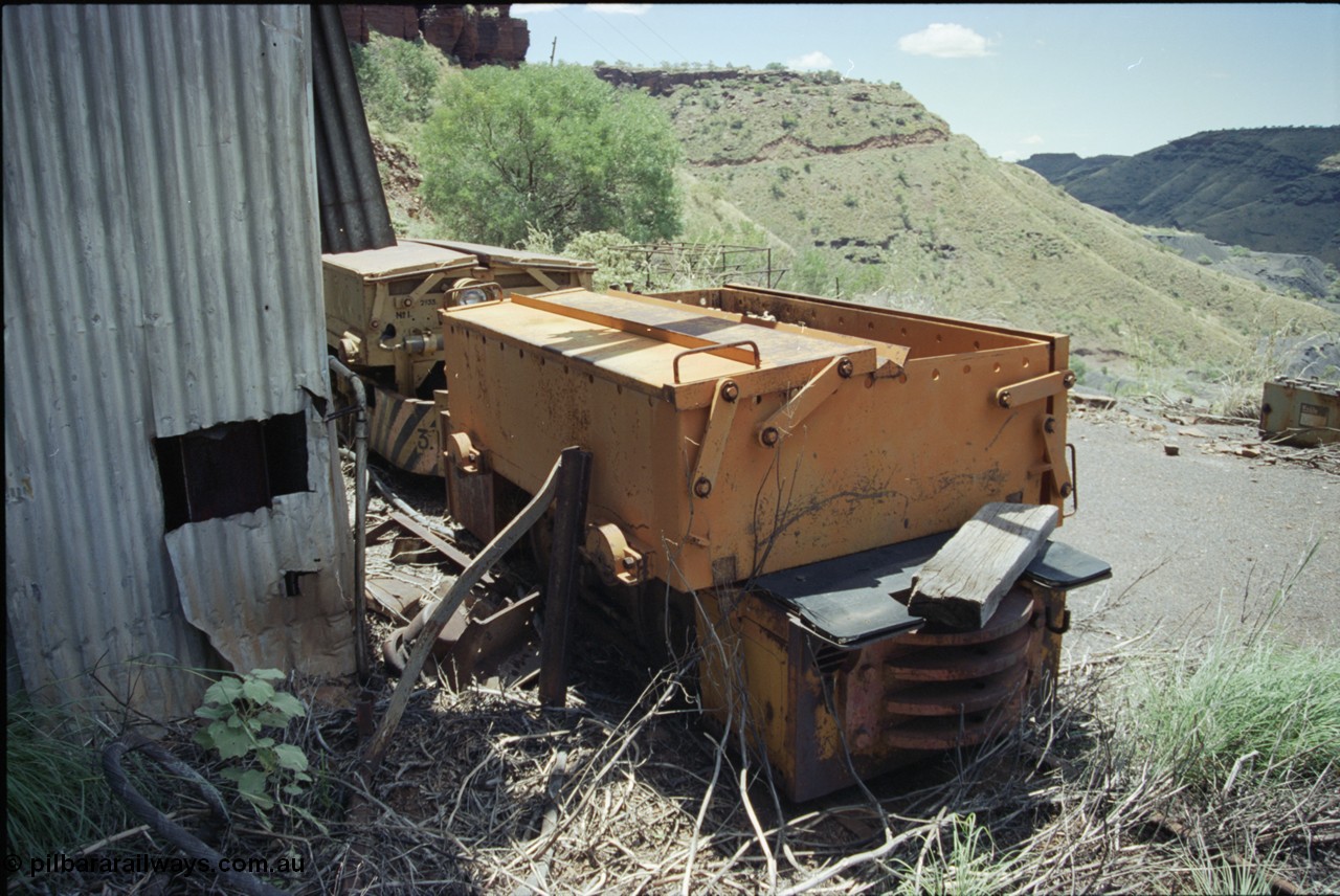 198-02
Wittenoom, Colonial Mine, asbestos mining remains, rear view of battery box and battery locomotive GEMCO Hauler serial 12304-05/10/65, motor H.P. 2/11, volts 80, drawbar pull (lbs.) 1250 built by George Moss Pty Ltd Leederville, WA.
Keywords: Gemco;George-Moss;12304-05/10/65;