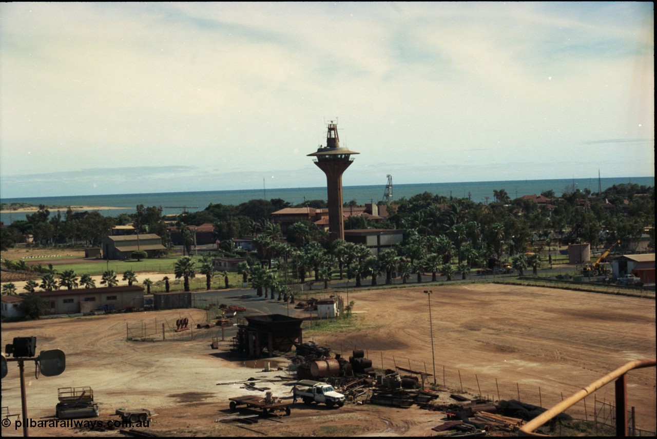 198-25
Port Hedland Port, view of Port Control Tower, grassed area with shed is for helicopter operator, the Esplanade Hotel can also be seen along with the lookout tower behind the visitors centre.
