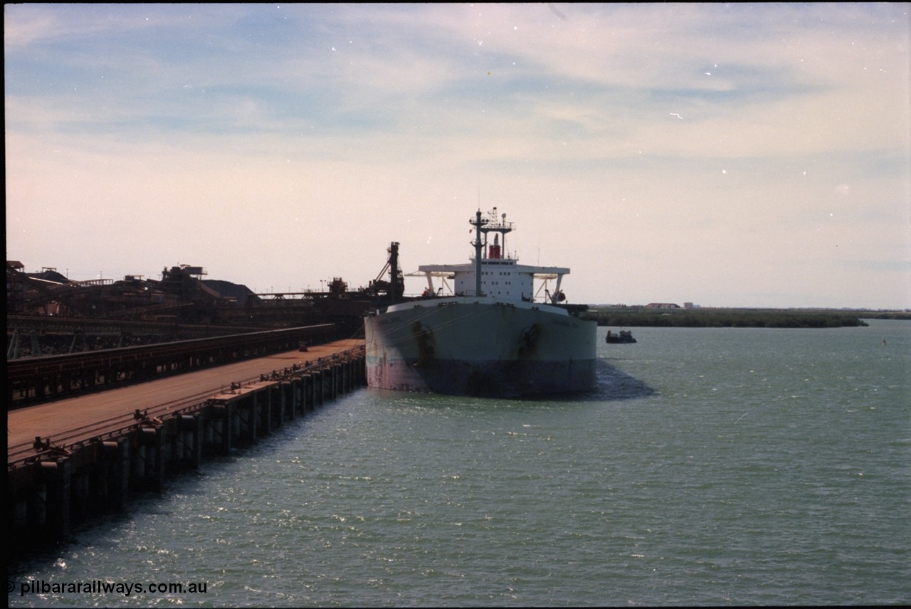 198-34
Port Hedland Port, BHP Nelson Point view of Berth B with vessel being loaded by Shiploader One.
