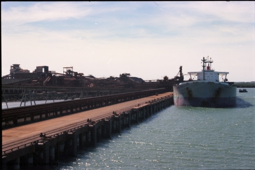 198-35
Port Hedland Port, BHP Nelson Point view of Berth B with vessel being loaded by Shiploader One.
