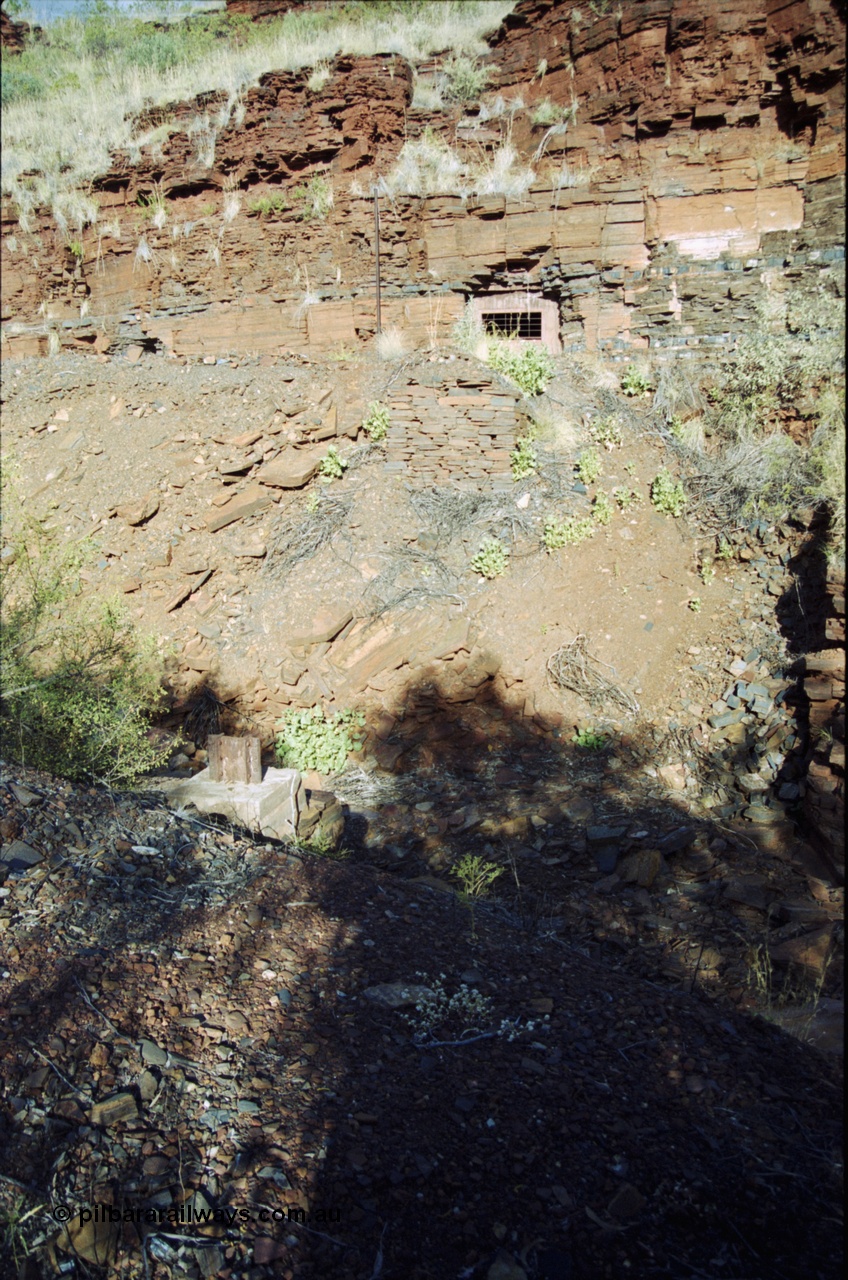 204-01
Yampire Gorge, remains of asbestos mining, view across creek to sealed up drive entry No. 7.
