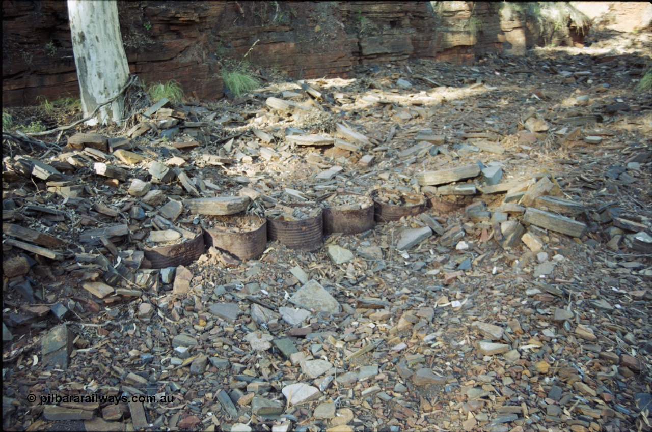 204-05
Yampire Gorge, remains of asbestos mining, how foundations were made, buried 44 gallon drums filled with rock.
