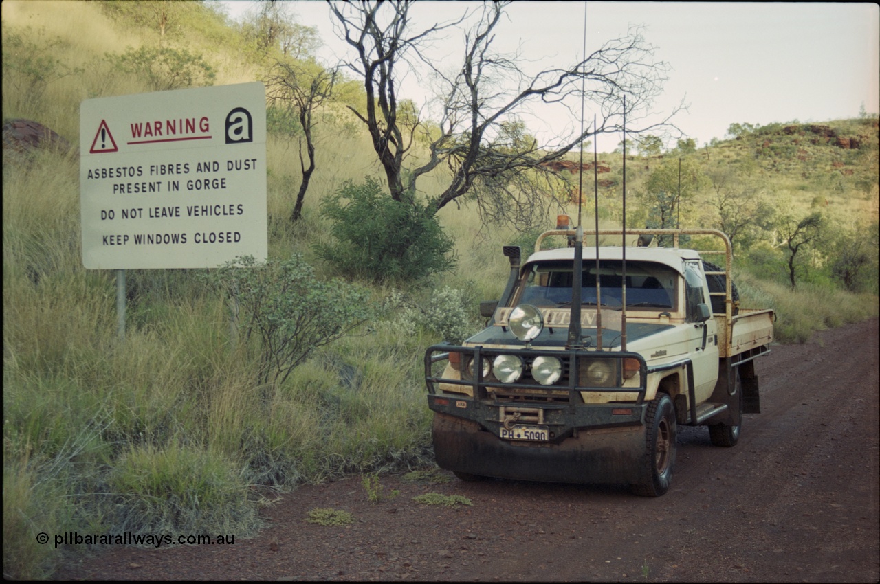 204-11
Yampire Gorge, road out of the gorge area with warning sign, Toyota HJ75 Landcruiser ute, PH 5090.
