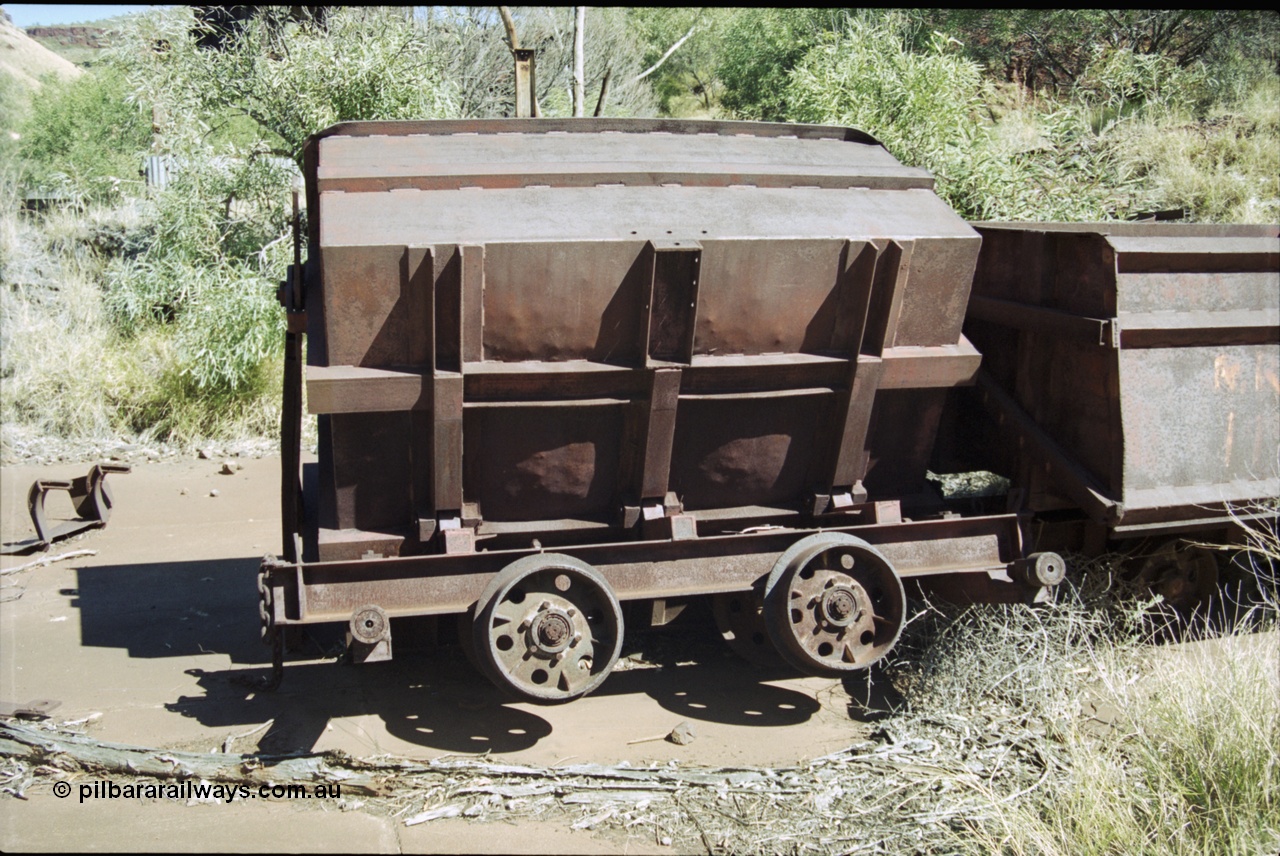 204-22
Wittenoom Gorge Mine, remains of asbestos mining, underground tipping ore cars, detail view of wheels and underside of car.
