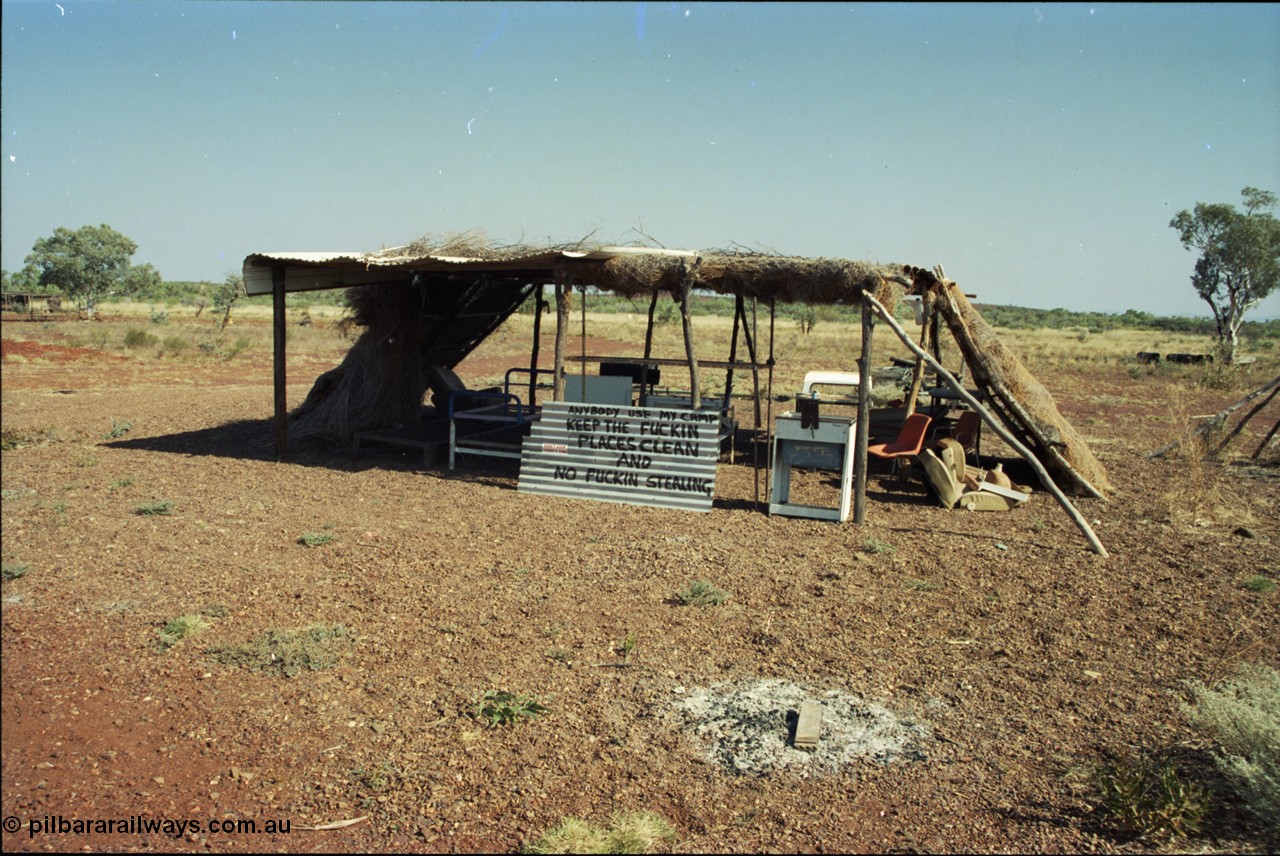 205-01
Roebourne - Wittenoom Road, Chichester Downs, camp located 4 km east of Rio Tinto railway, sign says it all.
