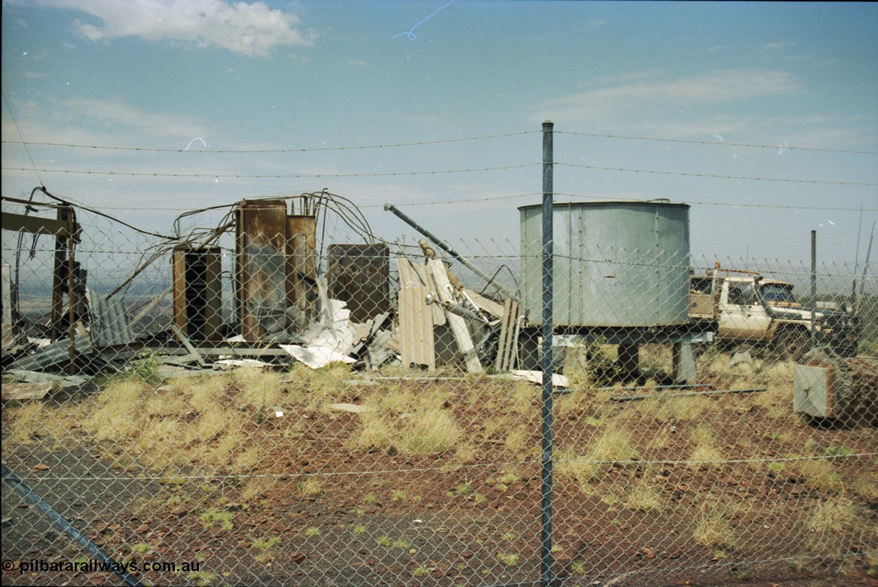 205-25
Drillers Ridge, Wittenoom, the DME (Distance Measuring Equipment) tower (located at 957 metres) was a navigation aid for the Department of Civil Aviation for the Wittenoom airport, the site was also used by Telecom for providing 'radio links' for phones into Wittenoom prior to the current tower located at the eastern edge of town which links back to Auski Roadhouse.
