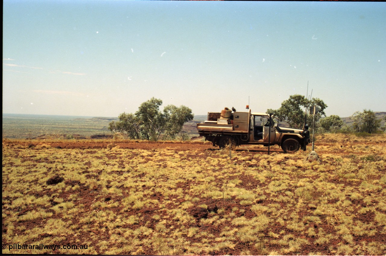 205-30
Koodaideri, survey mark or trig point, looking east with Fortescue valley on the left, Rio wants to mine in this area, and have been playing around here for many years.
