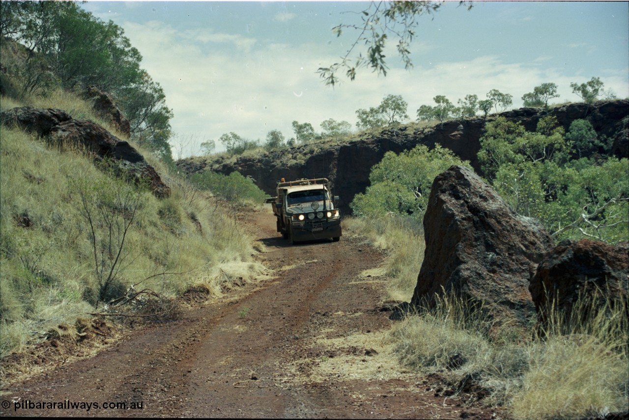 205-36
Koodaideri, track leading up to the underground drive, about 500 metres before the drive was a big warning sign about radio active substances.
