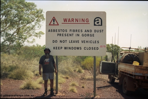 205-26
Yampire Gorge, asbestos sign, Pope Searle getting some fibre.
