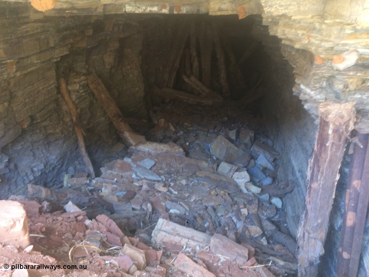 160101 2300
Wittenoom Gorge, Gorge Mine area, view inside drive No. 5, formally sealed, erosion has collapsed the sealing door, geodata: [url=https://goo.gl/maps/DhrpUNab8Px] -22.3247417 118.3277889 [/url], iPhone 5S image.
