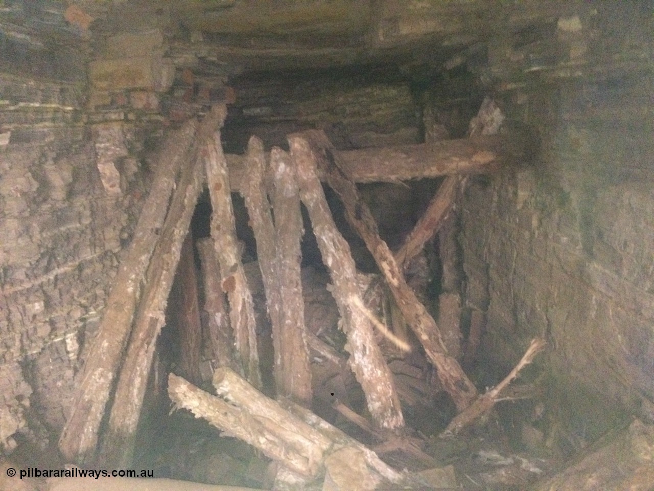 160101 2302
Wittenoom Gorge Mine area, view inside drive No. 5, bush cut timber poles to restrict access, geodata: [url=https://goo.gl/maps/DhrpUNab8Px] -22.3247417 118.3277889 [/url], iPhone 5S image.
