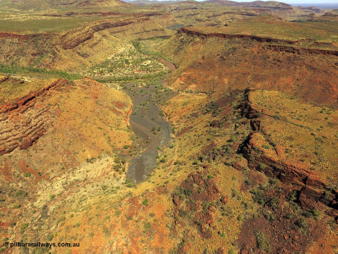 160101 DJI 0010
Wittenoom Gorge, view from above East Gorge looking north west with the tailings stacked up the gorge and the remains of the settlement in the middle, Wittenoom is out the top right corner. [url=https://goo.gl/maps/Sh2ZPqKDDKdkPsjs7]Geodata[/url].
