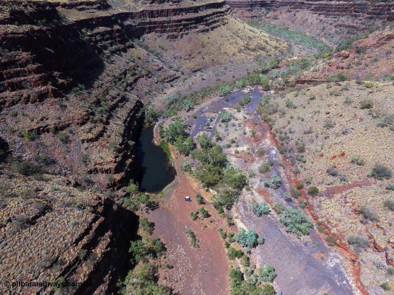 160101 DJI 0013
Wittenoom Gorge, view from above the Gorge Mine area and pool, looking south west, campers at pool, the track continues on for a little further than here, and then foot access can be gained into gorge in Karijini National Park. [url=https://goo.gl/maps/gL4iyihuq5BNSAWS9]Geodata[/url].
