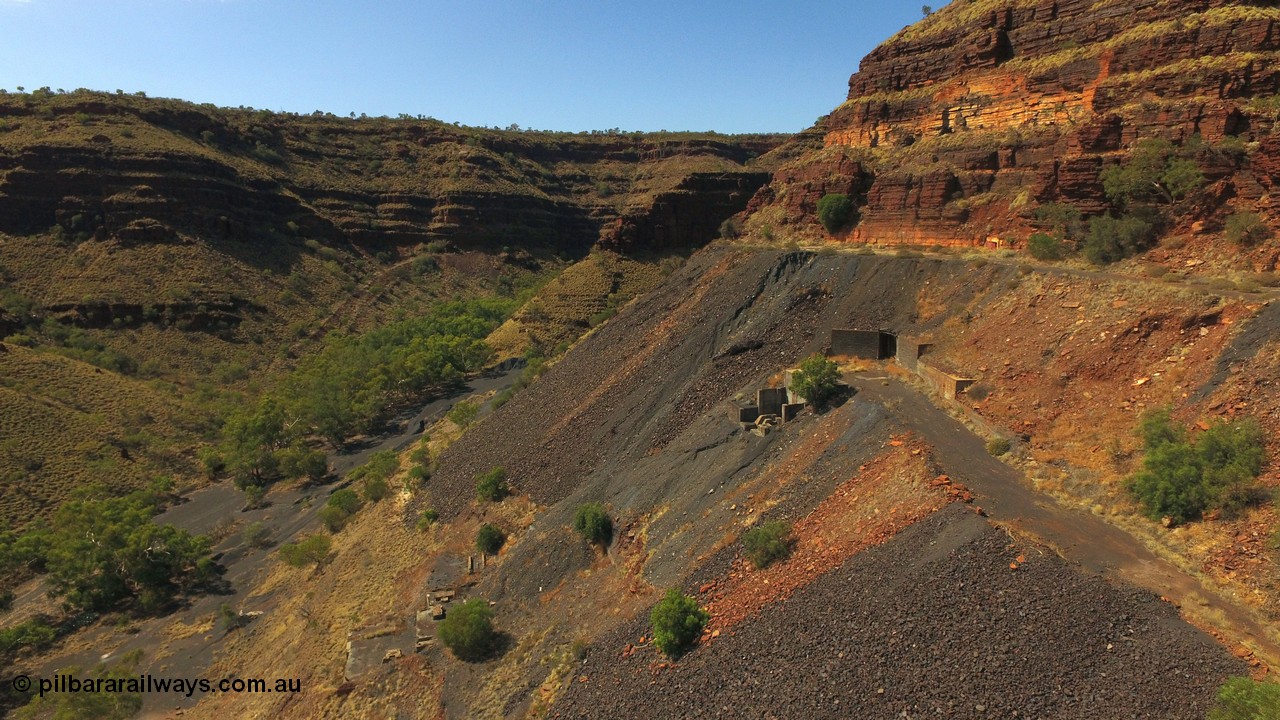 160103 DJI 0055
Colonial Mill and mine ruins located within Wittenoom Gorge. Concrete foundations remain of the once impressive crusher, mill, dryer and bagging plant. See images of the site intact [url=http://www.pilbararailways.com.au/gallery/thumbnails.php?album=118] here [/url]. Geodata: [url=https://goo.gl/maps/SjAFSM93y4q] -22.3107554 118.3185943 [/url].
