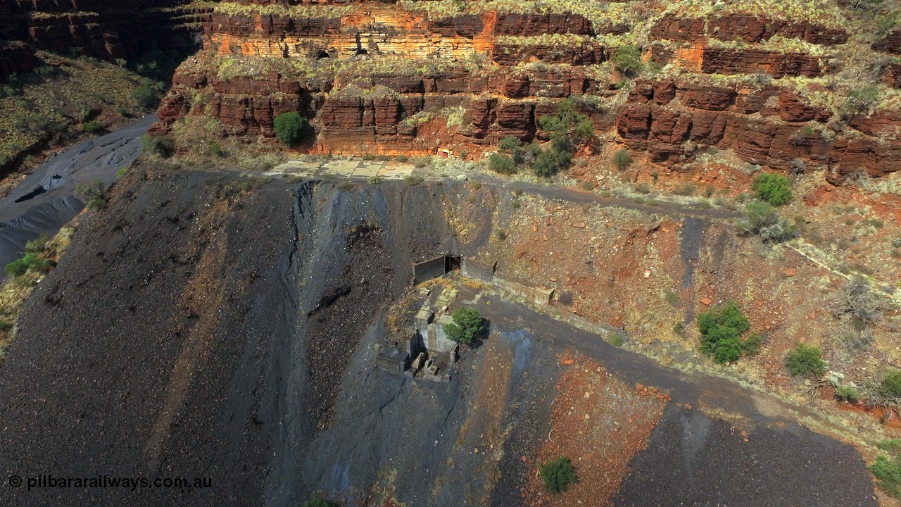 160103 DJI 0058
Colonial Mill and mine ruins located within Wittenoom Gorge. The large concrete area on the upper level is the former mining offices and railway workshops, a sharp eye will see the sealed mine entry with a red door. Concrete foundations remain of the once impressive crusher, mill, dryer and bagging plant. See images of the site intact [url=http://www.pilbararailways.com.au/gallery/thumbnails.php?album=117] here [/url], 194-08 shows the sealed red entry point. Geodata: [url=https://goo.gl/maps/BD1BiF3pHTr] -22.3112605 118.3190326 [/url].
