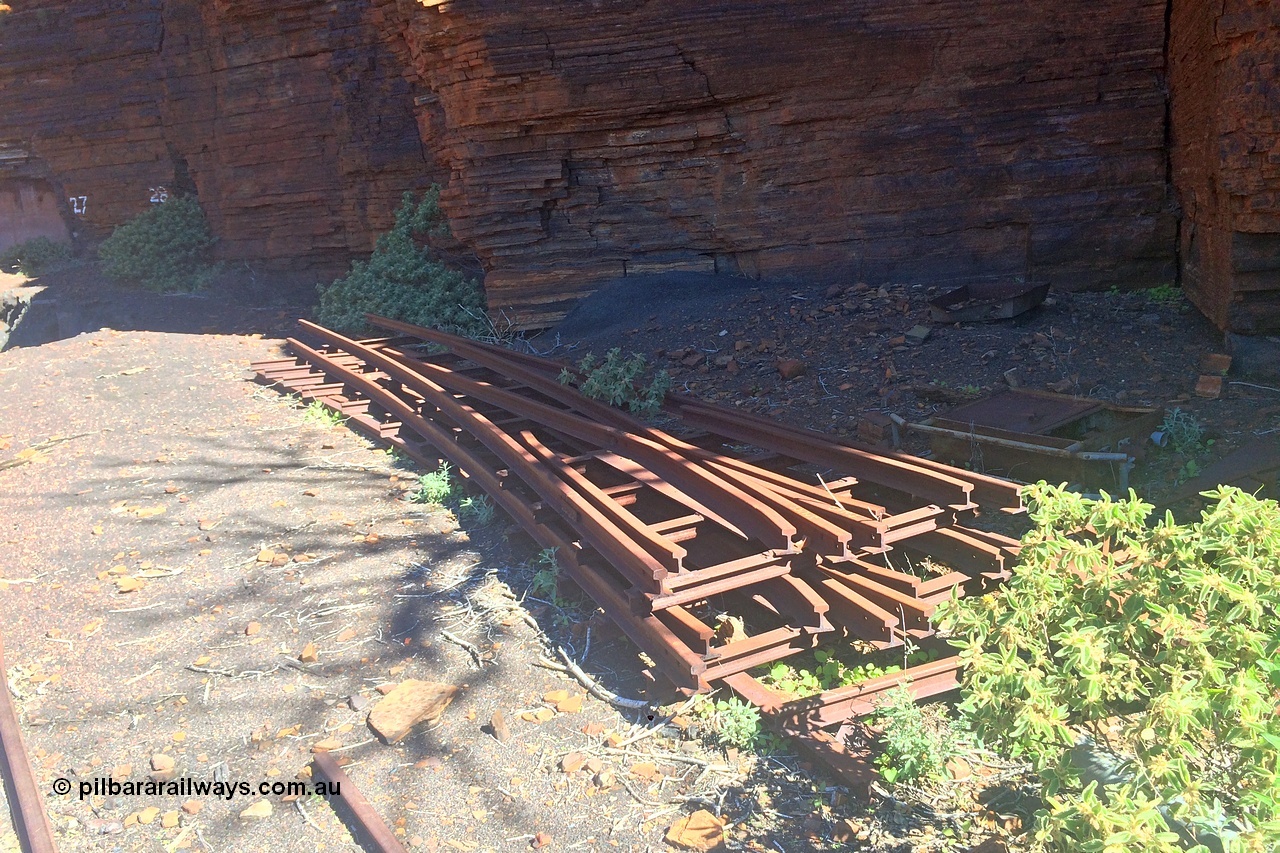 160710 iPh5S 2803
Wittenoom Gorge, Colonial Mine, view looking across the level to adits #28 and #27. Tailings fill has eroded, old track points or switches stacked up. [url=https://goo.gl/maps/maDEBws4ULiH7nWz6]Geodata[/url].
