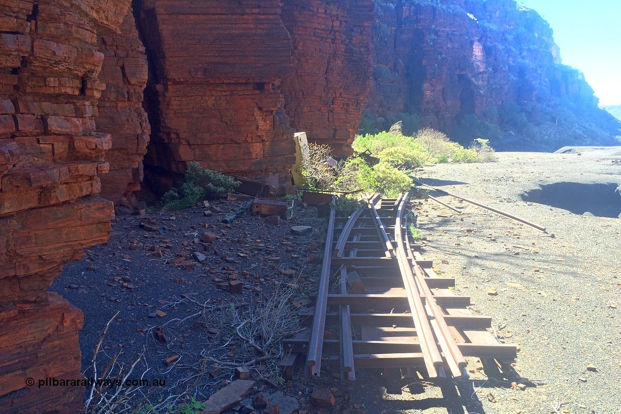 160710 iPh5S 2806
Wittenoom Gorge, Colonial Mine, reverse view from 2802, looking north across the level of the western wall. Old track points or switches stacked up. [url=https://goo.gl/maps/maDEBws4ULiH7nWz6]Geodata[/url].
