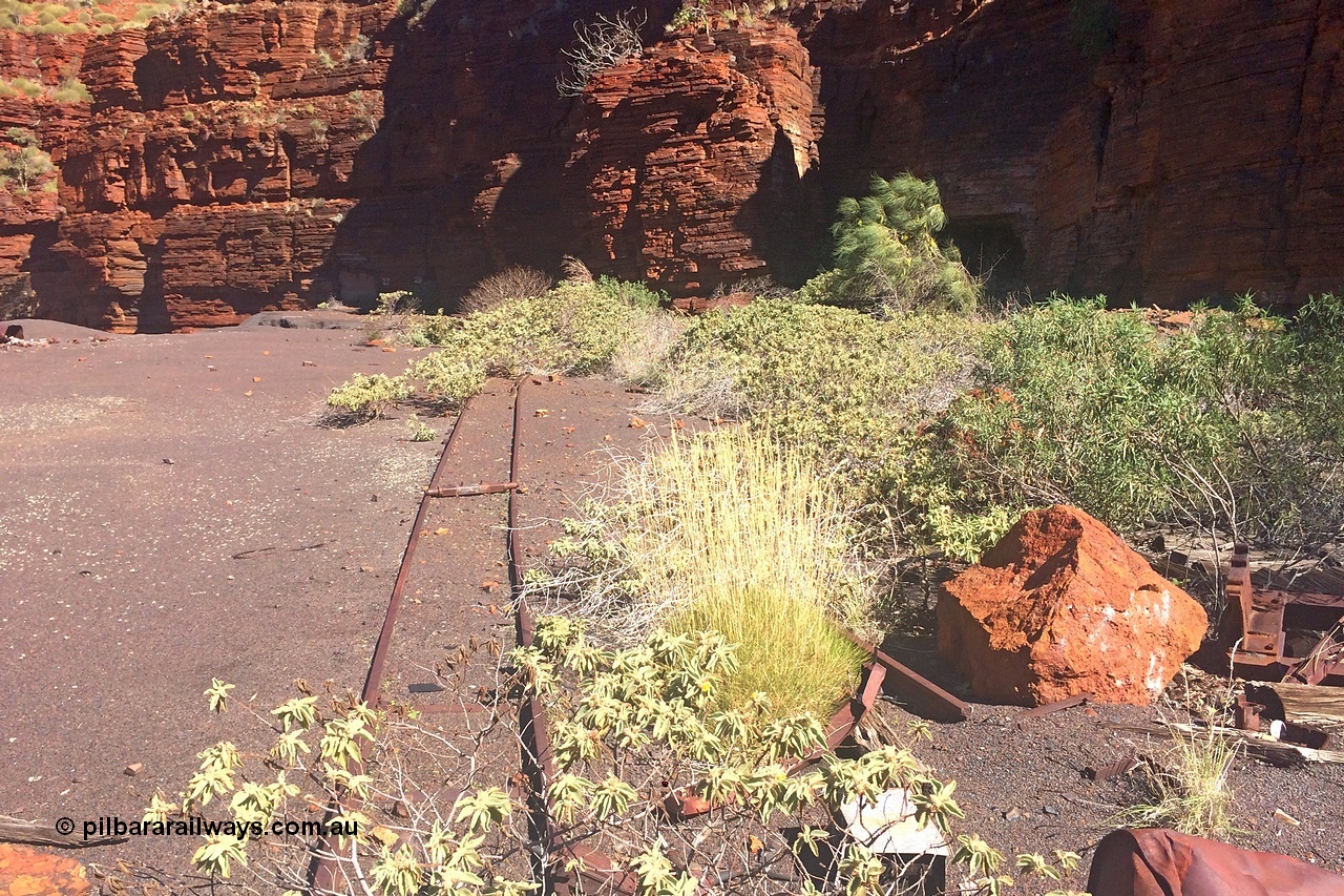 160710 iPh5S 2813
Wittenoom Gorge, Colonial Mine, upper level looking across to adits 27 and 28, sleeper pile to the right, track leading away to adits 27 and 28.
