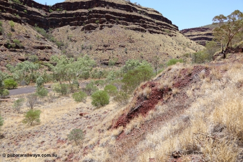 160101 9780
Wittenoom Gorge, Gorge Mine area, asbestos mining remains, site of milling building on left, access ramp to mine adits on the right. [url=https://goo.gl/maps/sbEo62sHhRL2]Geodata[/url].
