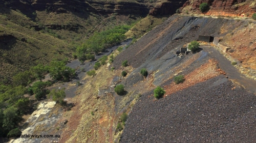 160103 DJI 0056
Colonial Mill and mine ruins located within Wittenoom Gorge. Concrete foundations remain of the once impressive crusher, mill, dryer and bagging plant. See images of the site intact [url=http://www.pilbararailways.com.au/gallery/thumbnails.php?album=118] here [/url]. Geodata: [url=https://goo.gl/maps/QEcEeSgwoES2] -22.3107510 118.3185928 [/url].
