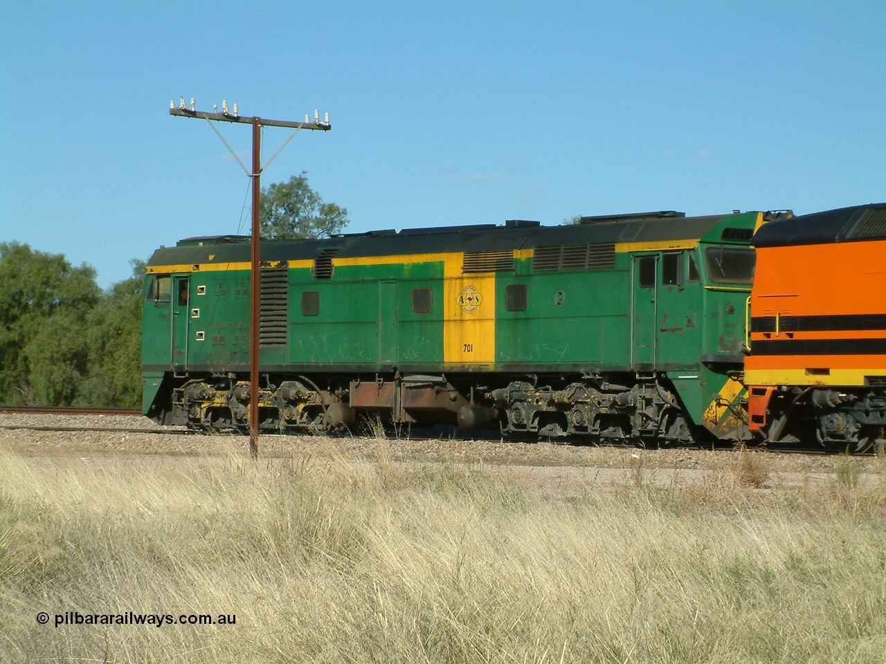 030403 153816
Gladstone, former South Australian Railways AE Goodwin built DL500G ALCo designated the 700 class, class leader 701 serial G6042-2 leads a grain train being loaded on the 3rd April 2003.
Keywords: 700-class;701;G6042-2;AE-Goodwin;ALCo;DL500G;