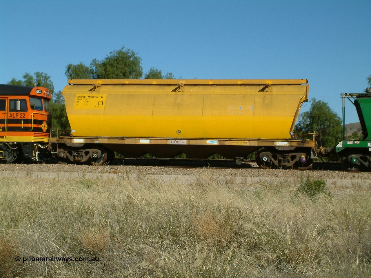 030403 153850
Gladstone, former WAGR owned grain waggon built by Scotts of Ipswich Qld in 1966-67 as a WW type waggon, later converted to WWS type, here WWS 32029 is being loaded as part of an Australian Southern grain working, these waggons were later coded AGSY type. 3rd April 2003.
Keywords: WWS-type;WWS32029;Scotts-Qld;