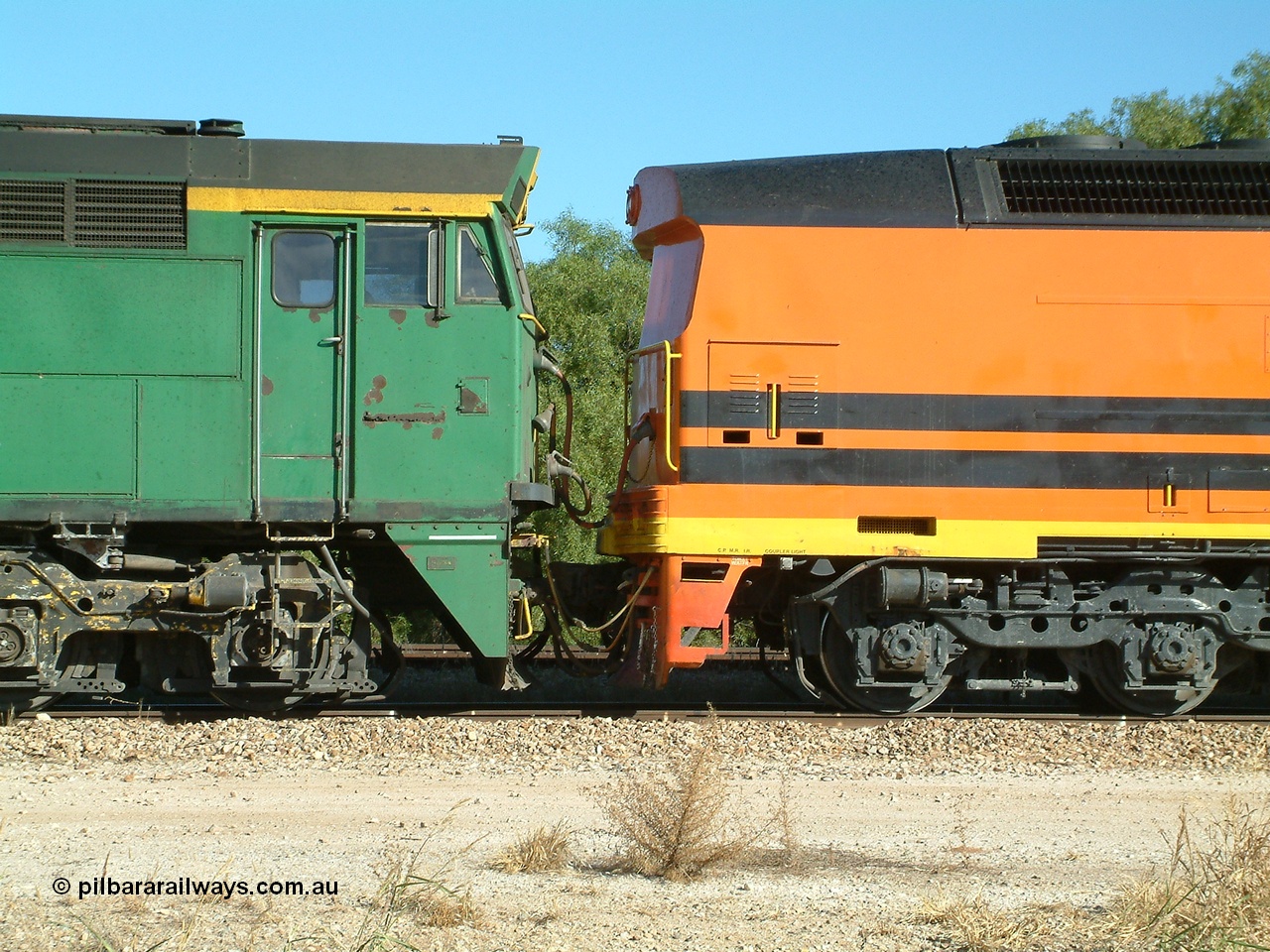 030403 154207
Gladstone, MKA (Morrison Knudsen Australia) rebuilt AL class AL 23 into EMD JT26C-2M model for Australian National in 1993 as the ALF class, here ALF 22 serial 94-AB-022 shows the blanked off No.2 end cab as it is coupled to an A E Goodwin built ALCo 700 class on the 3rd April 2003.
Keywords: ALF-class;ALF22;94-AN-022;MKA;EMD;JT26C-2M;AL-class;