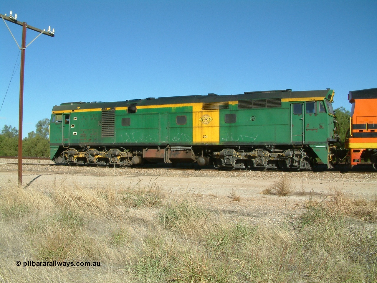 030403 154252
Gladstone, former South Australian Railways AE Goodwin built DL500G ALCo designated the 700 class, class leader 701 serial G6042-2 leads a grain train being loaded on the 3rd April 2003.
Keywords: 700-class;701;AE-Goodwin;ALCo;DL500G;G6042-2;
