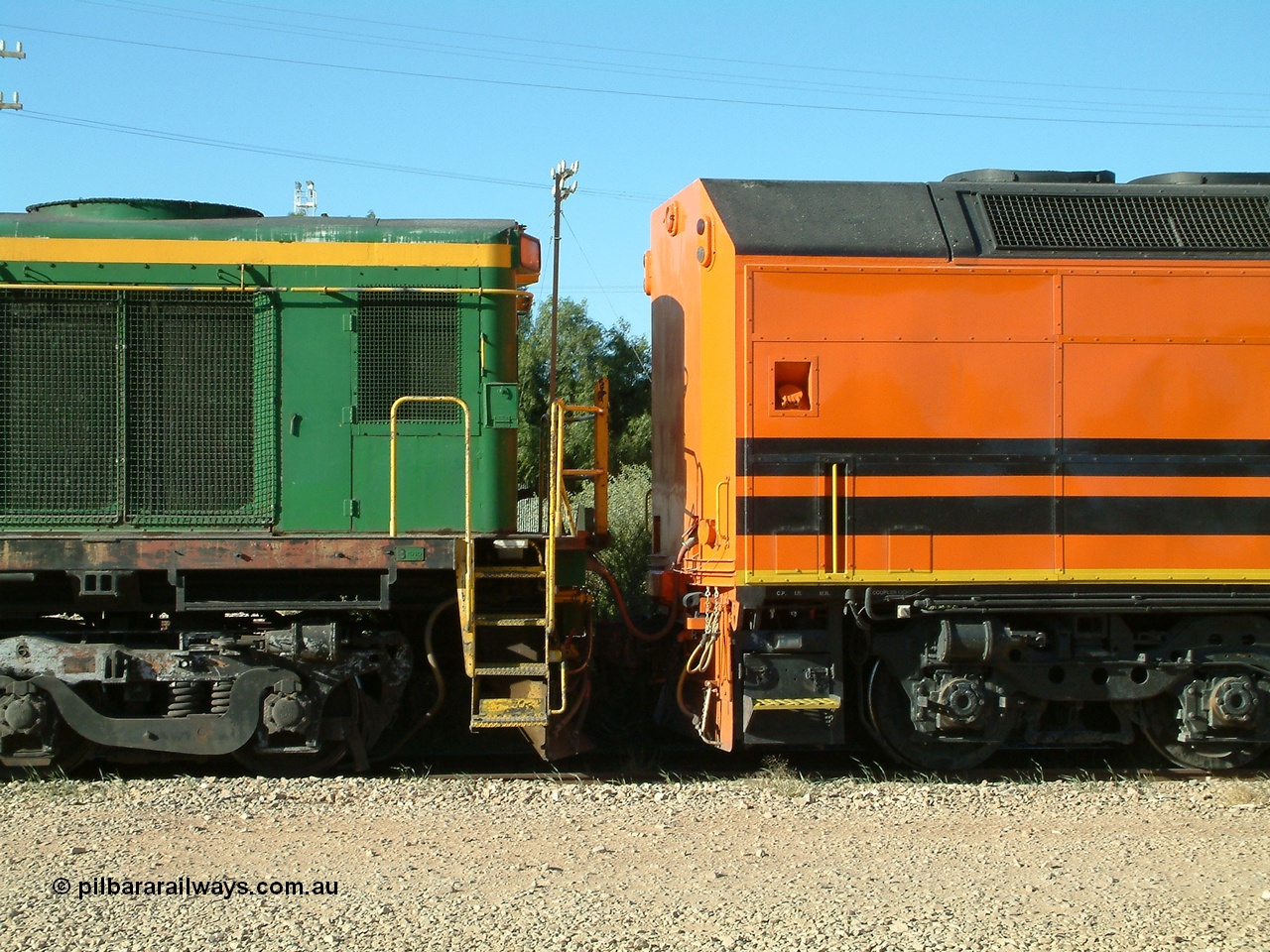 030403 162155
Crystal Brook, view of rear end of CLF class leader CLF 1 'City of Whyalla' serial 93-AN-1, rebuilt by MKA to EMD model AT26C-2M from CL class unit CL 2 in 1993, coupled to a 600 class ALCo unit. 3rd April 2003.
Keywords: CLF-class;CLF1;93-AN-1;MKA;EMD;AT26C-2M;CL-class;