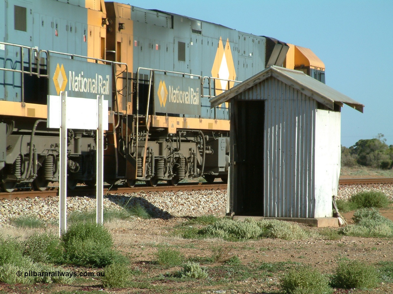 030404 082817
Port Germein, Perth bound steel and intermodal hurries through on the main behind National Rail's Goninan built GE Cv40-9i model NR class units NR 30 serial 7250-06 / 97-236 and a sister unit. 4th April 2003.
