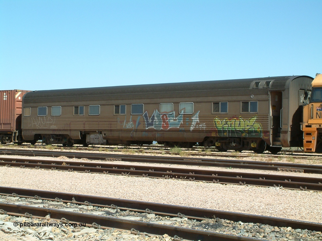 030404 125244
Port Augusta Spencer Junction yard, crew coach on Perth bound intermodal. 4th April 2003.
