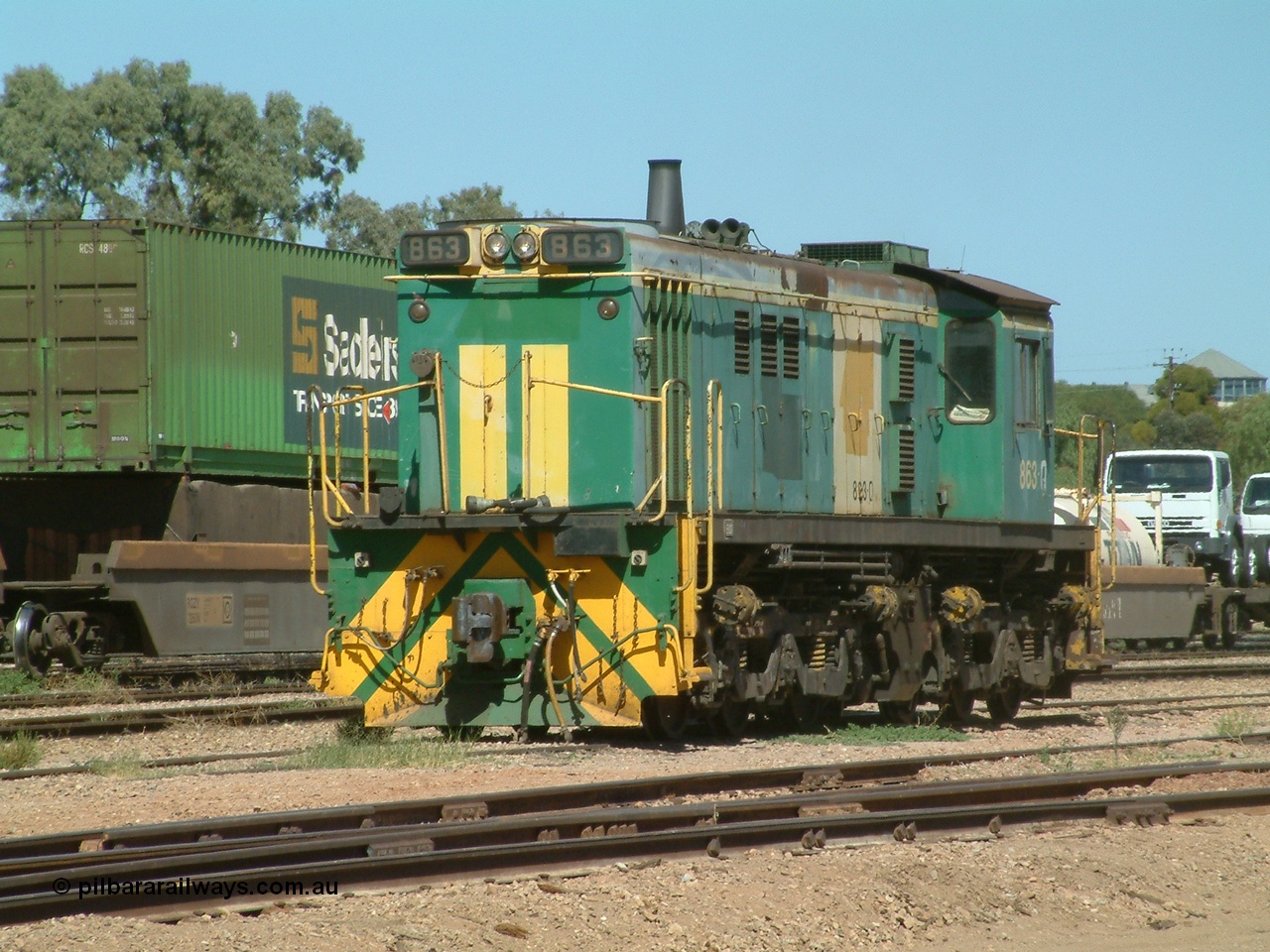 030404 131500
Port Augusta, Spencer Junction shunt loco 830 class unit 863 serial 84709 is an AE Goodwin built ALCo DL531 model and entered service in June 1963. 4th April 2003.
Keywords: 830-class;863;AE-Goodwin;ALCo;DL531;84709;