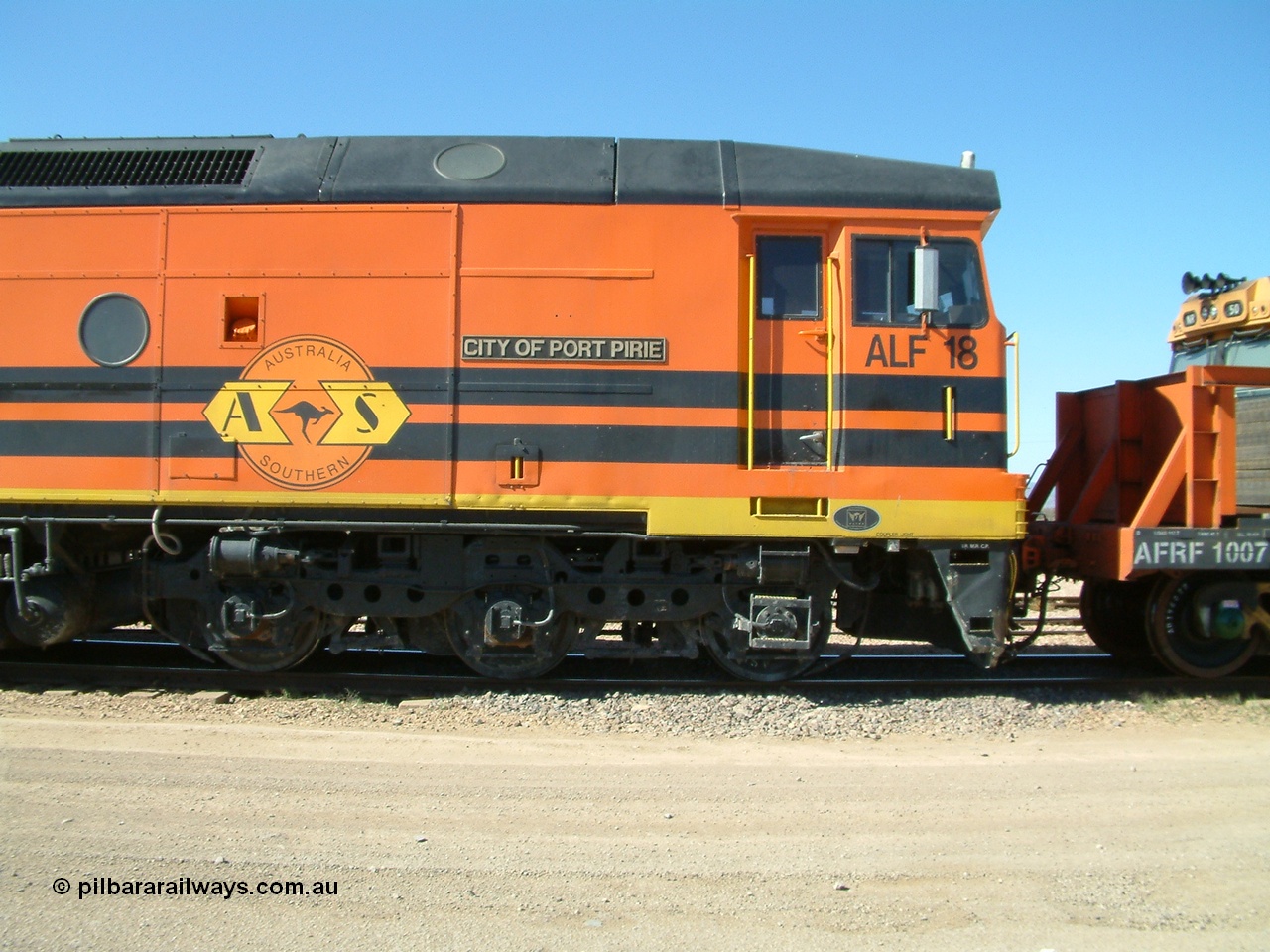 030404 141602
Port Augusta Spencer Junction yard, cab side shot of Morrison Knudsen Australia rebuild unit ALF 18 City of Port Pirie, model JT26C-2M serial 94-AN-018 in Australia Southern livery, originally AL class AL 21.
Keywords: ALF-class;ALF18;MKA;EMD;JT26C-2M;94-AN-018;rebuild;AL-class;AL21;Clyde-Engineering;EMD;JT26C;76-837;