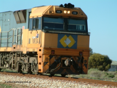 030404 082810
Port Germein, Perth bound steel and intermodal hurries through on the main behind National Rail's Goninan built GE Cv40-9i model NR class units NR 30 serial 7250-06 / 97-236 and a sister unit. 4th April 2003.
Keywords: NR-class;NR34;Goninan;GE;Cv40-9i;7250-06/97-236;