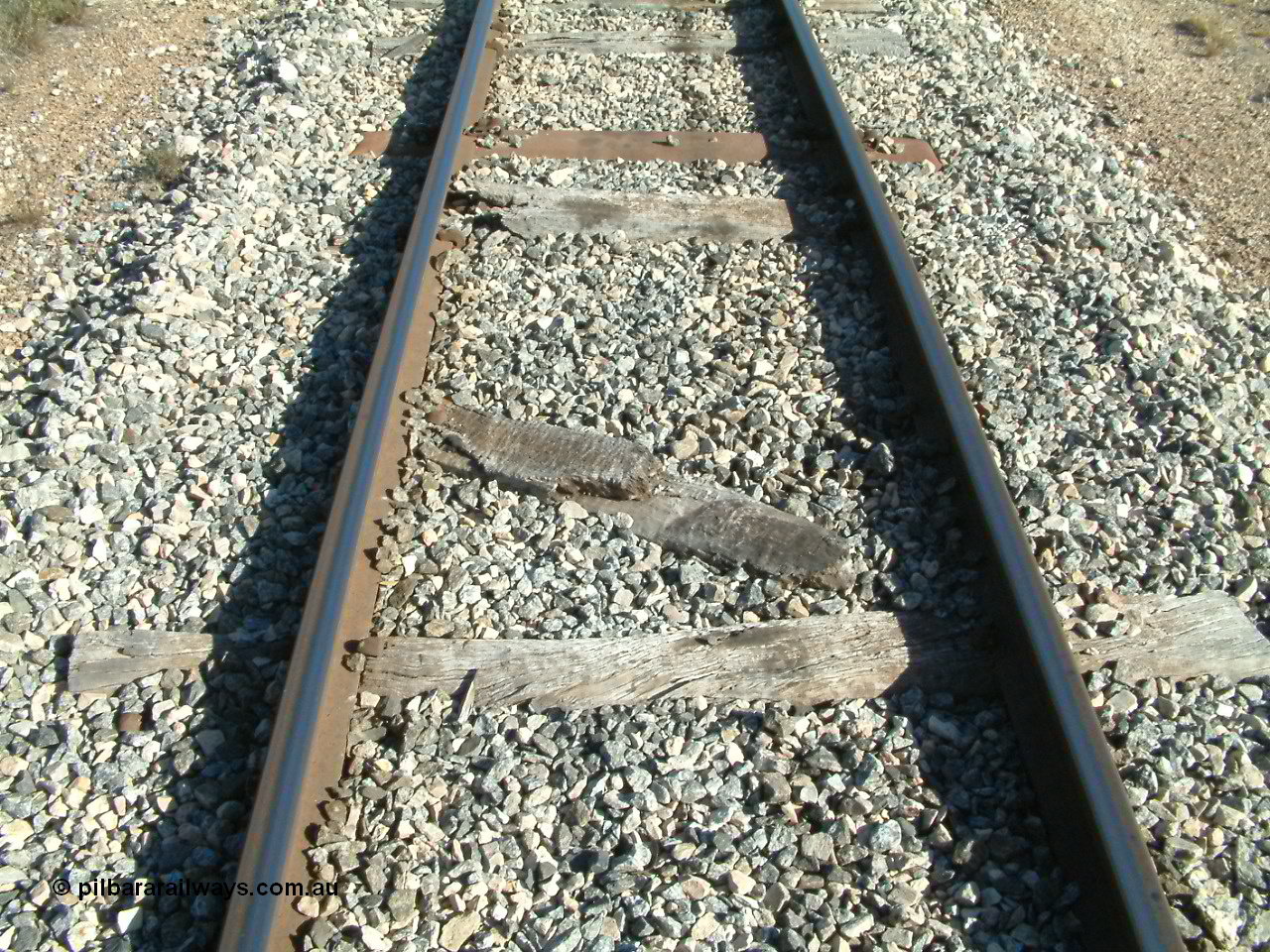 030405 154328
Lock, track view of the narrow gauge per way showing the dilapidated state of the sleepers hence the 20 km/h speed limit! 5th April 2003.
