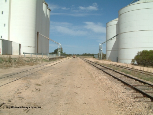 030405 140326
Kyancutta, yard view looking south with both silo complexes and their respective sidings either side of the mainline, looking south, April 5, 2003.
