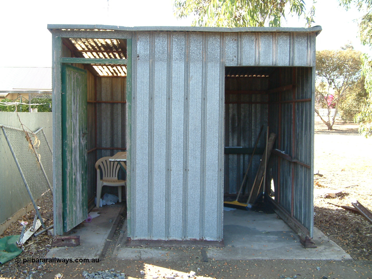 030406 095220
Cummins, second hand train control shed and waiting shelter sitting on the site of the former gangers trolley shed. 6th April 2003.
