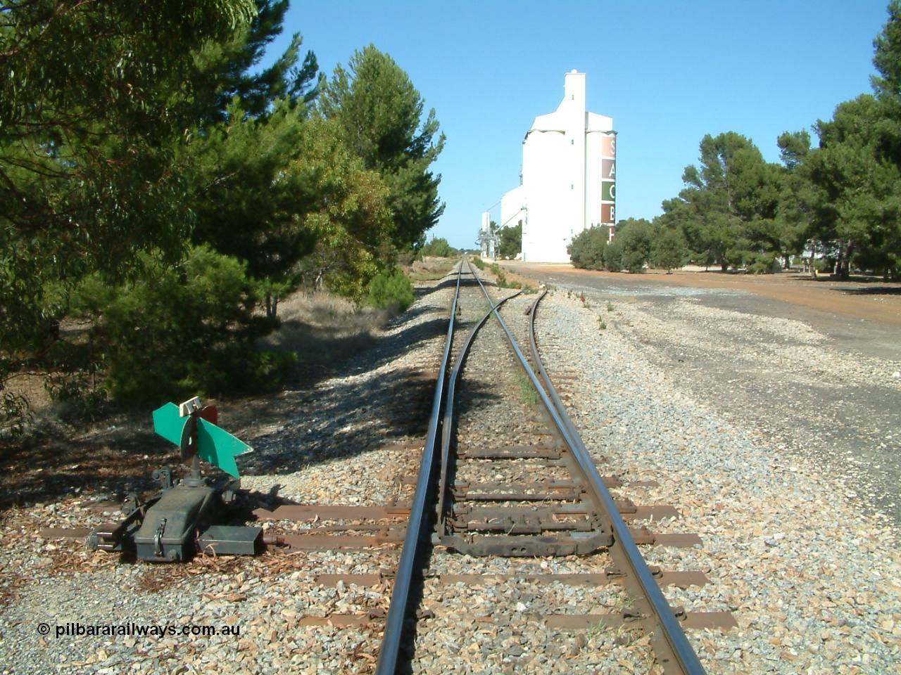 030406 102814
Edillilie, station located at the 51.3 km, opened in November 1907 as Mortlock, renamed in October 1908. Yard overview looking south with silo complexes on the right. 6th April 2003.
