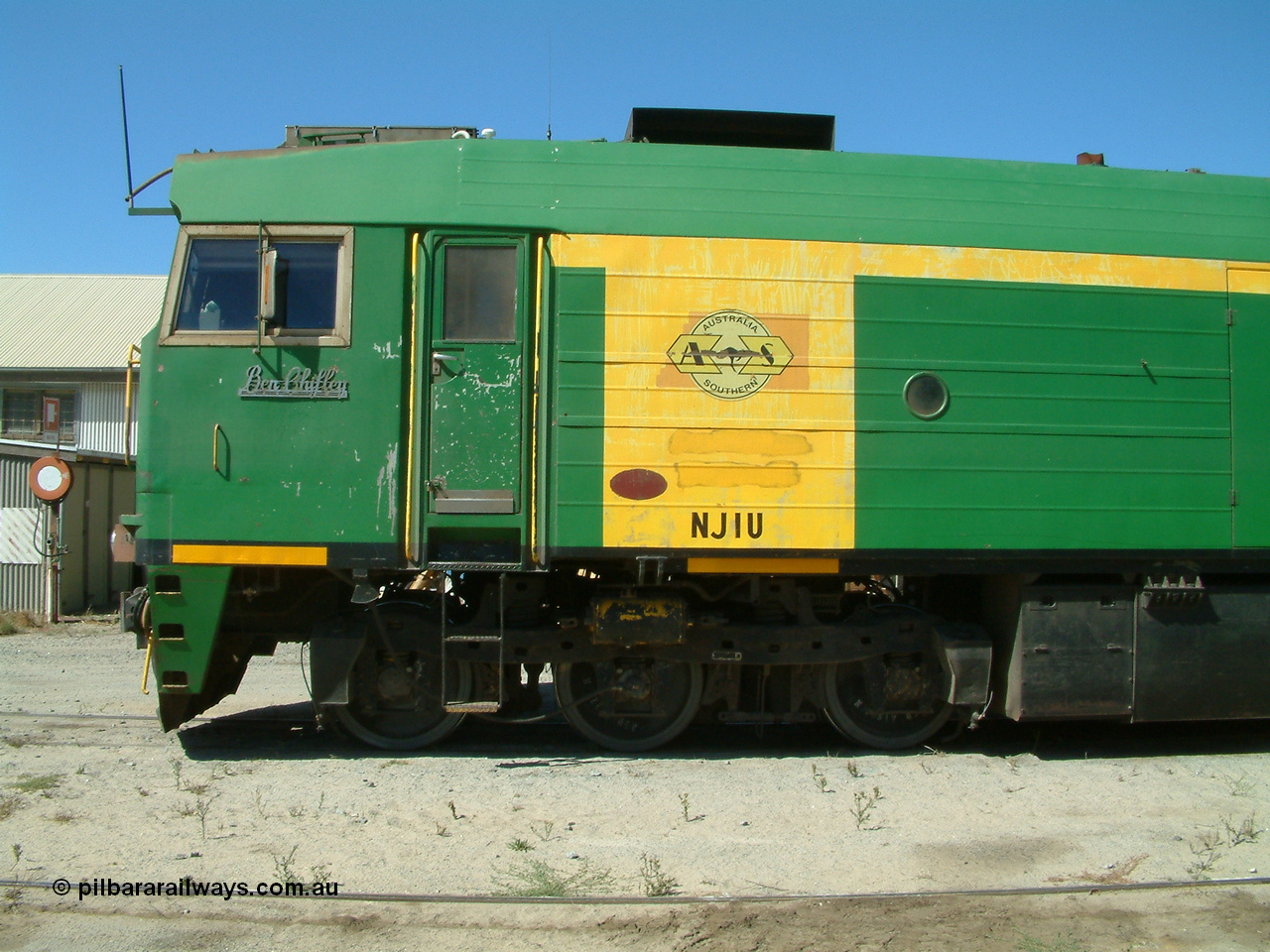 030406 113758
Port Lincoln loco workshops, still wearing the former owner's AN livery, Australian Southern locomotive and NJ class leader NJ 1 'Ben Chifley' Clyde Engineering EMD model JL22C serial 71-728, cab side view, shows check letter of U. 6th April 2003.
Keywords: NJ-class;NJ1;Clyde-Engineering-Granville-NSW;EMD;JL22C;71-728;