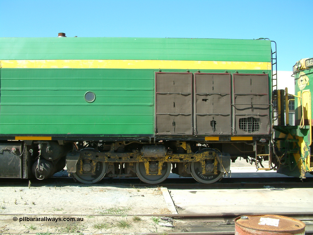 030406 113816
Port Lincoln loco workshops, still wearing the former owner's AN livery, Australian Southern locomotive and NJ class leader NJ 1 'Ben Chifley' Clyde Engineering EMD model JL22C serial 71-728, no. 2 end view. 6th April 2003.
Keywords: NJ-class;NJ1;71-728;Clyde-Engineering-Granville-NSW;EMD;JL22C;