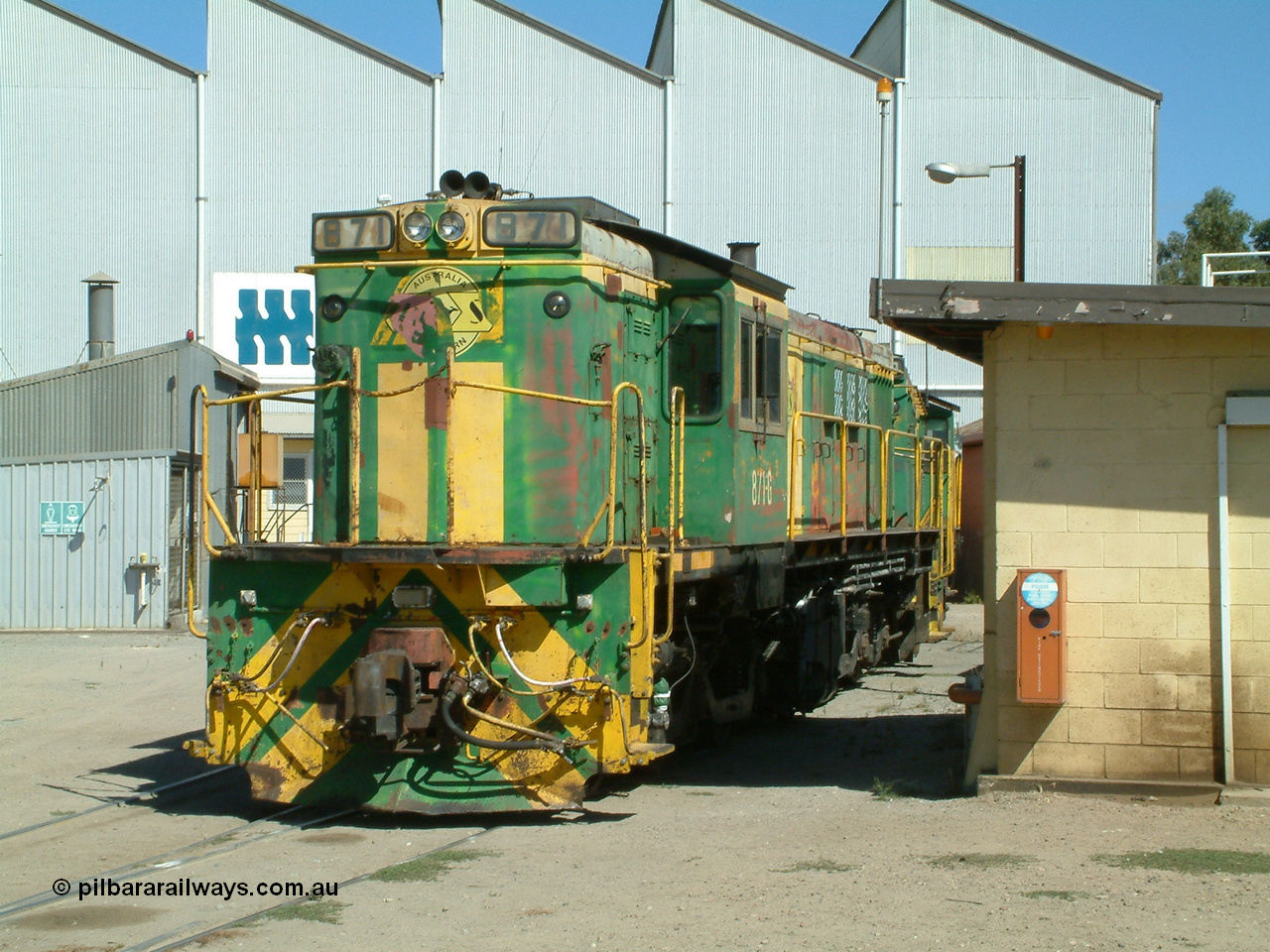 030406 114422
Port Lincoln loco workshops, still wearing the former owner's AN livery, Australian Southern locomotive 830 class 871 AE Goodwin ALCo model DL531 serial G3422-01 with the check letter of G, this unit has been on the Eyre Peninsula Division since new in January 1966, seen here coupled to sister units. 6th April 2003.
Keywords: 830-class;871;AE-Goodwin;ALCo;DL531;G3422-1;