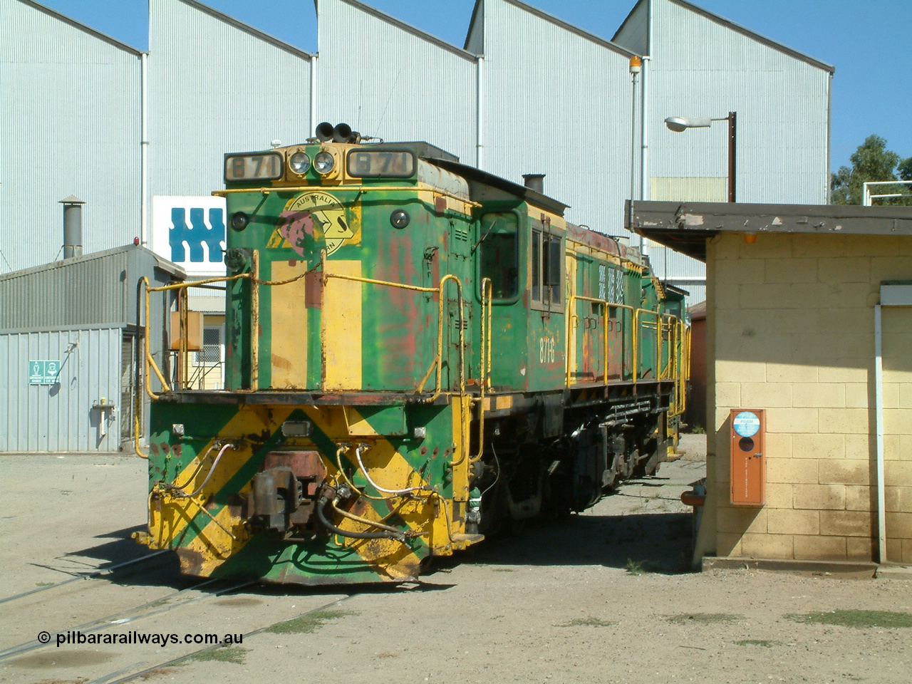 030406 114422
Port Lincoln loco workshops, still wearing the former owner's AN livery, Australian Southern locomotive 830 class 871 AE Goodwin ALCo model DL531 serial G3422-01 with the check letter of G, this unit has been on the Eyre Peninsula Division since new in January 1966, seen here coupled to sister units. 6th April 2003.
Keywords: 830-class;871;G3422-1;AE-Goodwin;ALCo;DL531;