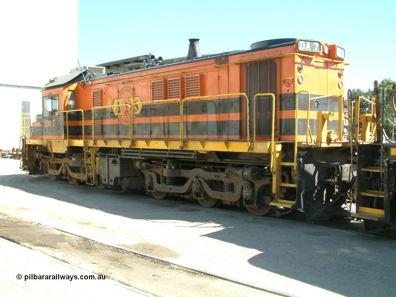 030406 114546
Port Lincoln loco workshops, wearing Australian Southern livery rebuild ALCo locomotive unit DA 7 started life as NSWGR 48 class 4813 AE Goodwin ALCo model DL531 serial 83713, rebuilt by Islington Workshops with long hood and parts from former 830 class 870 AE Goodwin ALCo model DL531 serial G6016-06 in 1998. B end roster view looking forward. 6th April 2003.
Keywords: DA-class;DA7;83713;Port-Augusta-WS;ALCo;DL531G/1;48-class;4813;rebuild;