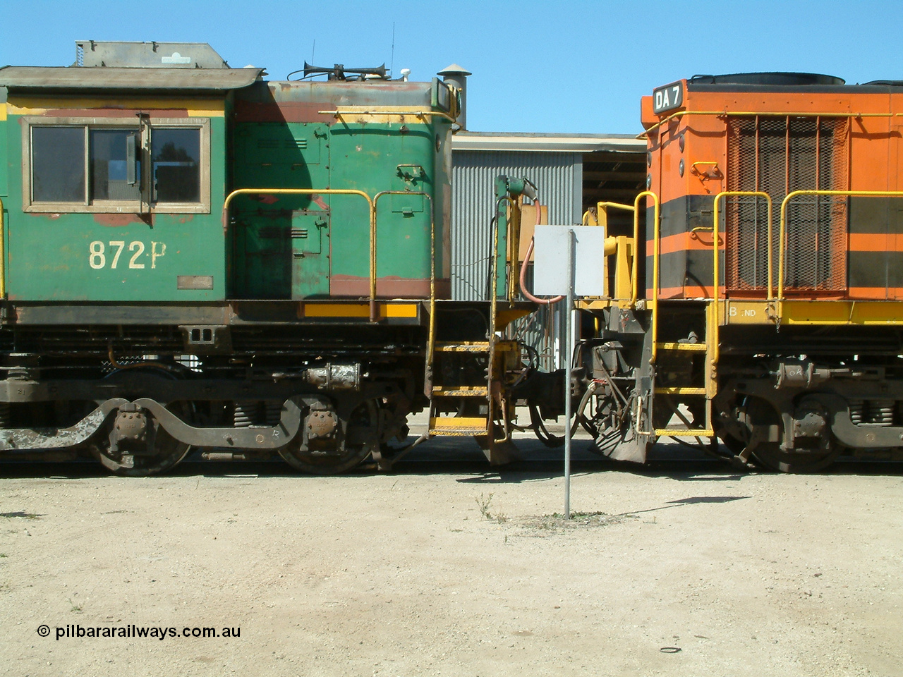 030406 114738
Port Lincoln loco workshops, still in former owner AN livery, Australian Southern 830 class locomotive 872 AE Goodwin ALCo model DL531 serial G3422-02 which has been on the Eyre Peninsula Division since being built in March 1966, cab side shot coupled to the B end of DA 7. 6th April 2003.
Keywords: 830-class;872;G3422-2;AE-Goodwin;ALCo;DL531;