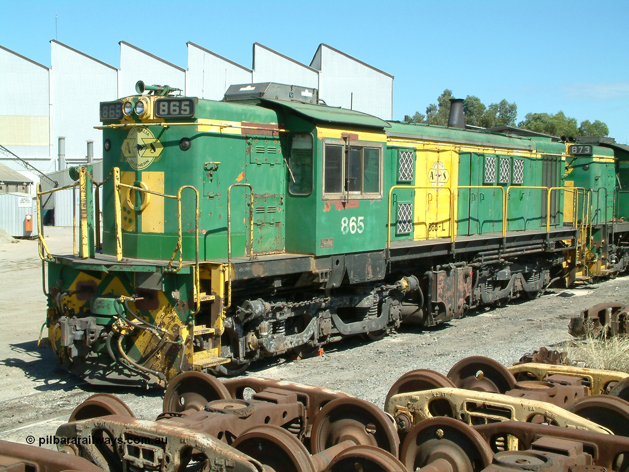 030406 115158
Port Lincoln loco workshops, still in former owner AN livery, Australian Southern 830 class locomotive 865 AE Goodwin ALCo model DL531 serial 84711, roster shot coupled to sister unit. 6th April 2003.
Keywords: 830-class;865;84711;AE-Goodwin;ALCo;DL531;